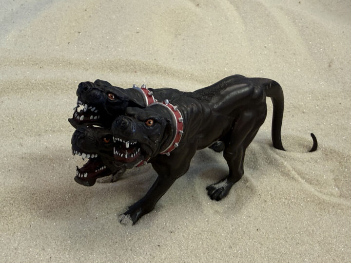 small three headed black dog for use in sandtray therapy in Beaverton