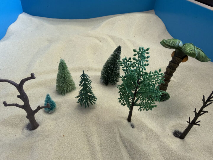 several tree toys used in sandtray therapy at Treehouse Counseling in Beaverton