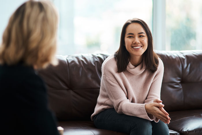 Woman with psychologist for individual therapy